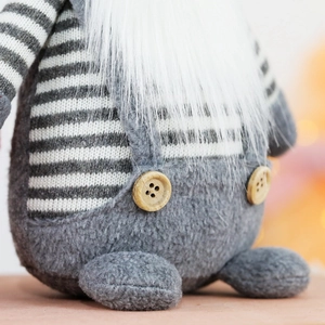 Swedish Christmas Gnome doll with knitted grey fabric and wooden buttons decoration