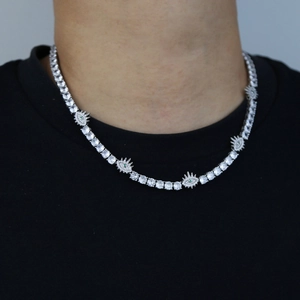 Hip hop silver tennis chain with white zircon and green eye-shaped charms on neck