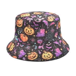 Detailed view of Halloween bucket hat with pumpkin, bat, and mushroom printed pattern