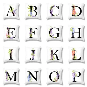 Detailed grid view of white pillowcases with floral alphabet letters A through P design