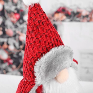 Nordic Christmas gnome plush with red cable knit hat and grey faux fur beard details