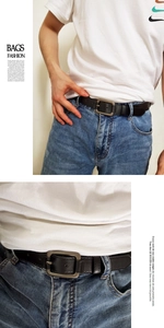 Vue détaillée d'une ceinture en cuir noir avec une boucle en métal gris mat sur un jean