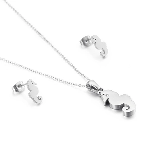 Silver seahorse jewelry set featuring a necklace and stud earrings with sparkling crystals