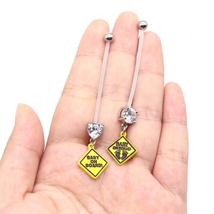 Flexible pregnancy belly button ring set with Baby on Board signs and heart zircon