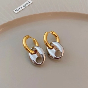 Modern two-tone 18K gold plated brass hoop earrings with silver pig-nose pendant