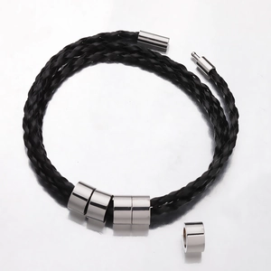 Braided black leather bracelet with five silver stainless steel beads and metal clasp