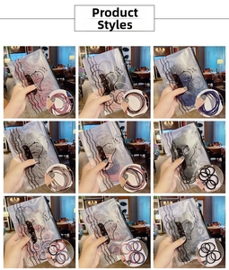 Détails d'élastiques à cheveux colorés en sachets dépolis avec motifs de poissons