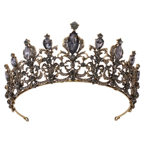 Detailed macro view of Baroque crown with dark grey crystals and bronze metal frame