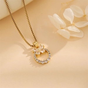 Minimalist golden circle butterfly pendant necklace with micro-pave cubic zirconia crystals