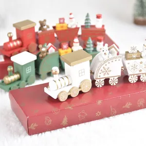 DIY wooden Christmas train ornament with snowmen and trees in red, white and green
