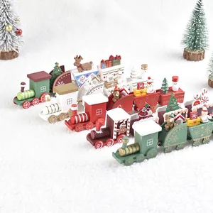 Handcrafted wooden Christmas train ornaments with Santa and reindeer on white plush