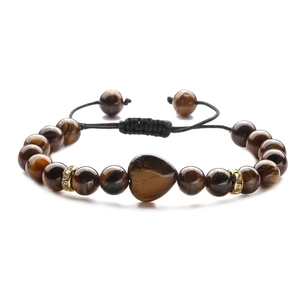 Tiger eye stone beaded bracelet with heart center stone and adjustable black cord
