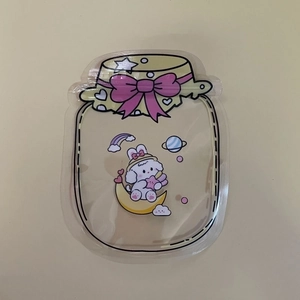 Jar-shaped clear plastic resealable bag with cute cartoon dog and rainbow illustrations