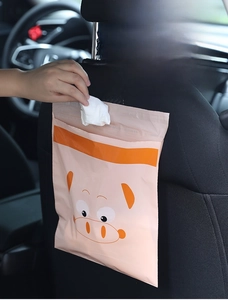Self-adhesive waterproof car trash bag with cute cartoon pig design for seat back use