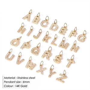 Set of 26 14K gold plated stainless steel initial pendants with zircon accents