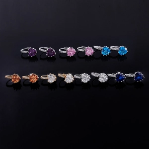 Detail view of heart-shaped AAA zircon earrings in various vibrant colors