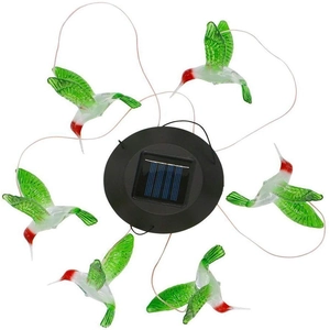 Solar powered wind chime featuring six vibrant red and green hummingbirds with bright LED lights