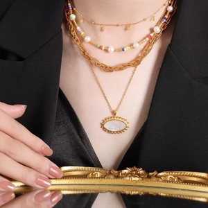 French vintage multilayer titanium steel necklace set with pearls and oval shell pendant