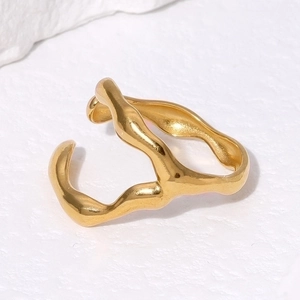Irregular wave pattern gold stainless steel open ring with a minimalist lava metal design