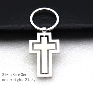 Rotating silver cross metal keychain accessory for car and bag, 8cm x 3cm size