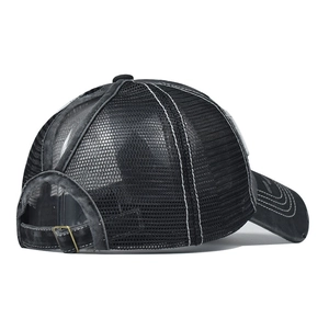 Detail of breathable mesh back and high ponytail opening on washed cotton baseball cap