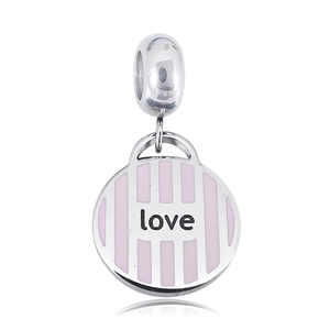 Close-up of pink striped clover charm with love engraving and silver spring buckle