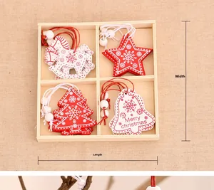 Top-down view of Christmas wooden ornaments set in a wooden box with snowflake patterns