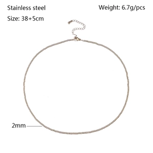 Macro detail of 2mm 18K gold-plated stainless steel bead chain with lobster clasp