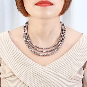 Three-layer silver stainless steel beaded necklace with elegant polished spheres for women