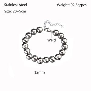 Macro shot of 12mm stainless steel bead bracelet with lobster clasp and sizing chain