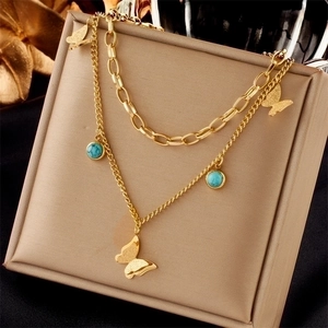 Double-layered gold titanium steel necklace with blue turquoise and butterfly pendant