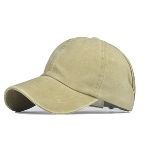 Detail view of khaki washed cotton ponytail baseball cap with vintage fabric texture