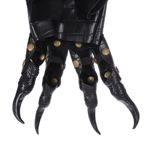 Detail of dragon claw gloves with black crocodile texture leather and metal rivets