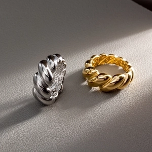 Minimalist croissant dome ring in gold and silver finish with sculptural lava design