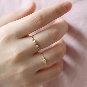 Minimalist 14K gold plated silver rings with heart shapes and sparkling micro-inlaid stones
