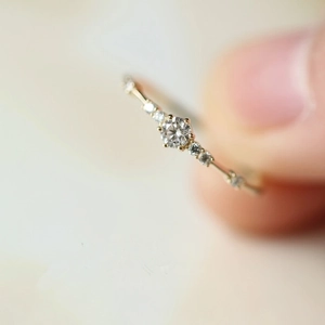 S925 silver 14K gold plated minimalist ring with 7 sparkling diamonds on finger