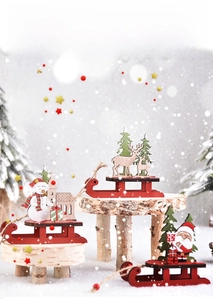 DIY Christmas wooden sleigh ornaments featuring Santa, snowman, and reindeer figures