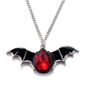 Silver bat pendant necklace with black enamel wings and teardrop red gemstone on O-chain