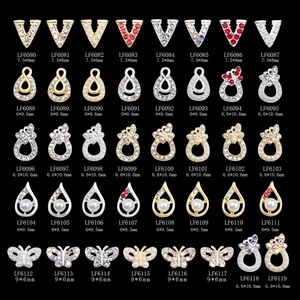 40 assorted alloy nail art charms with pearls and rhinestones in a gold and silver finish