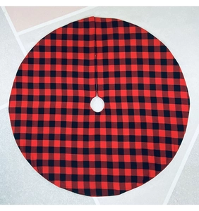 Close-up of red and black buffalo plaid Christmas tree skirt showing textile pattern