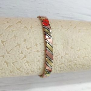 Adjustable magnetic twisted copper bracelet for women in tri-color gold and silver finish