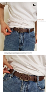 Détail d'une ceinture en cuir marron avec boucle vintage sur un jean bleu pour homme et femme