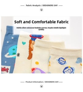 Detailed view of elastic ribbed cuffs and cartoon rocket patterns on cotton socks
