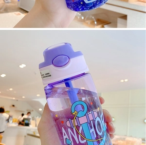 Close-up of purple translucent plastic water bottle with straw and anchor print