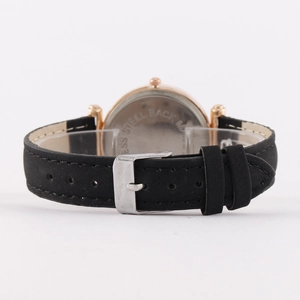 Back view of rose gold women's watch with black leather strap and stainless steel back