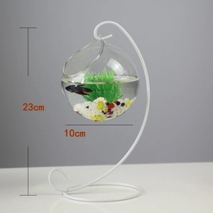 Macro view of hanging glass fish bowl on 23cm metal stand with colorful stones