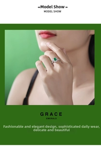 Detail of a 925 silver ring featuring a green oval gemstone surrounded by white zircons
