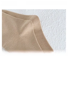 Detail of khaki cotton socks featuring reinforced toe and 3D heel design for durability