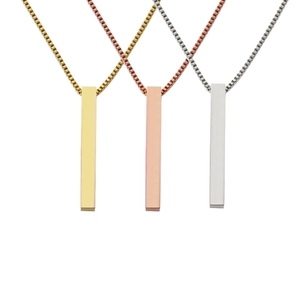 Three minimalist bar pendant necklaces in gold, rose gold, and silver on box chains