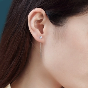 S925 sterling silver star threader earrings with delicate tassel chain on female model
